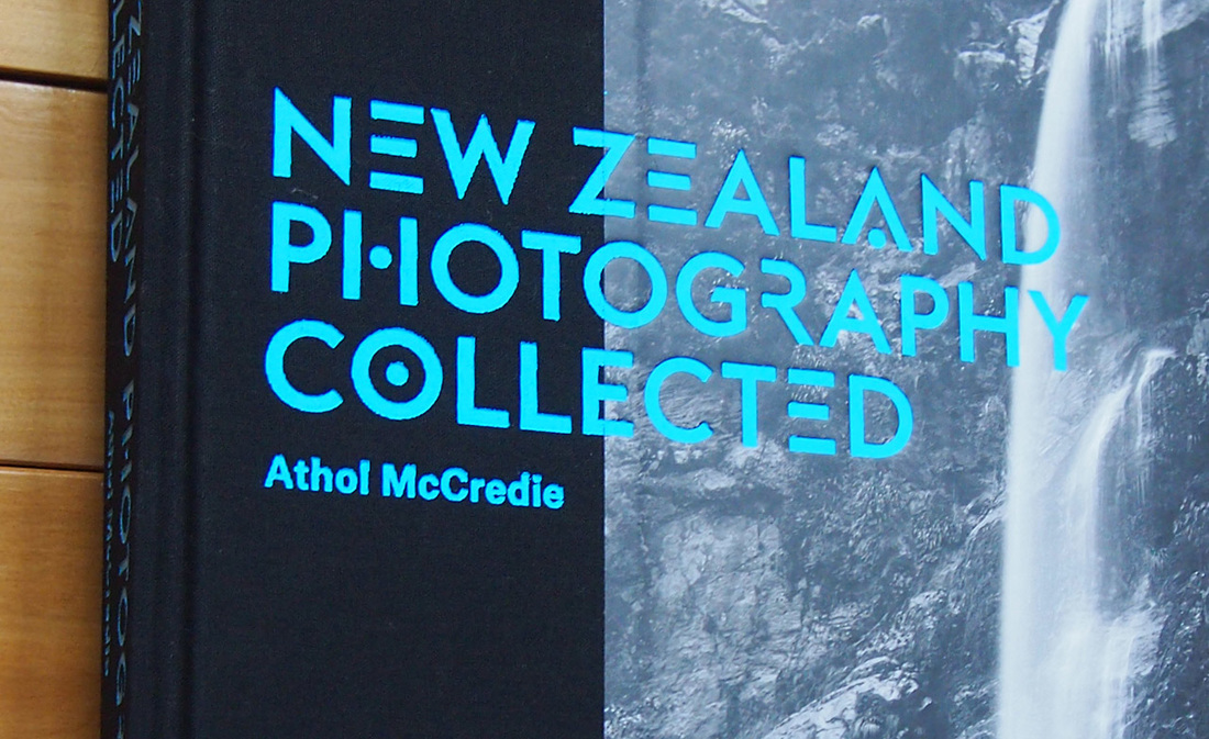 Detail of embossed text over linen, New Zealand Photography Collected, book review by James Gilberd Photospace Gallery