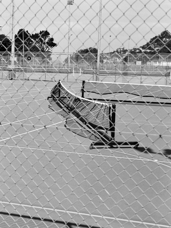 John Duke - untitled (4) - A Month of Sundays series, 2020, black and white film photography, photography during the covid-19 lockdown in New Zealnd, Photospace Gallery contemporary New Zealand photography wellington nz, a month of sundays online exhibition, Wellington during Covid-19 lockdown Alert Level 4, tennis court disused