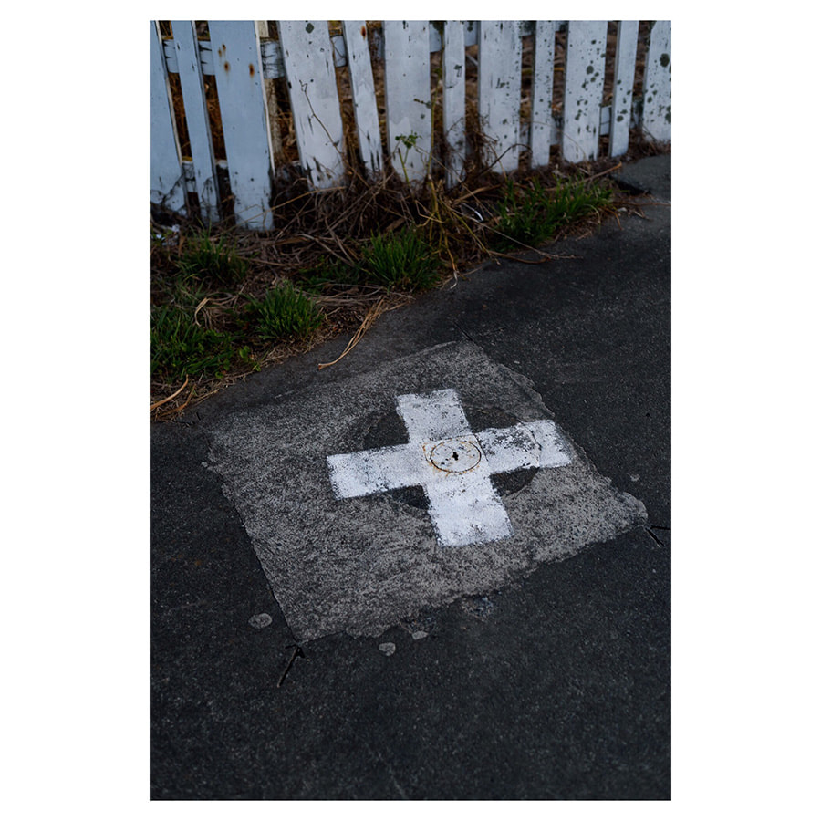 Peter Black - untitled 3, April 2020, 'A Month of Sundays - Responses to the Covid-19 Lockdown' online exhibition at PhotospaceGallery.nz, cross on road