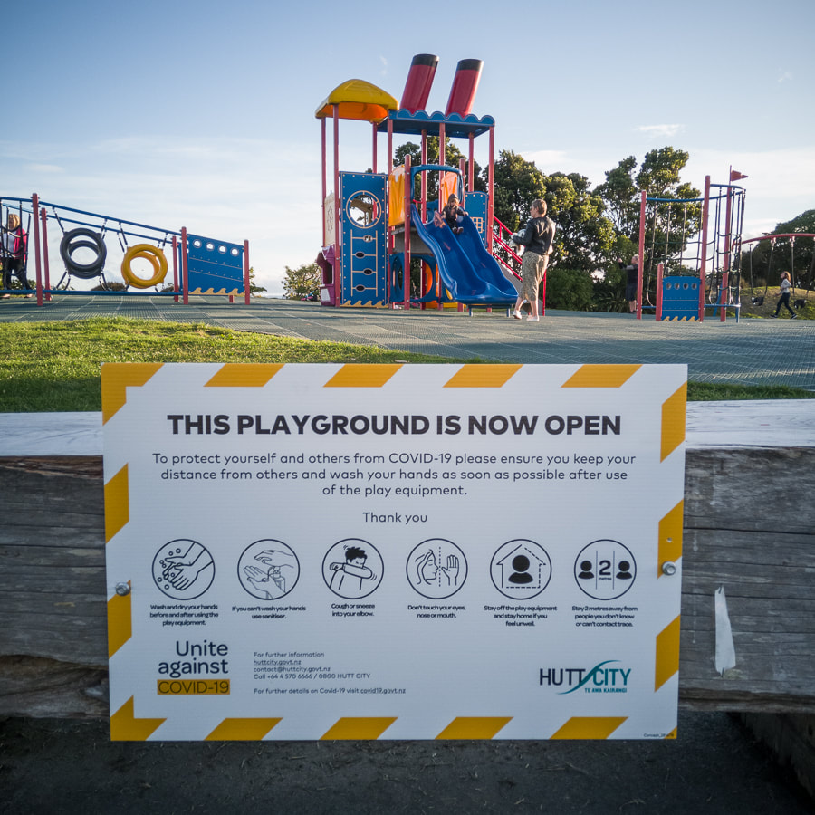 John Williams - Playground sign, level 2, Petone, Going Viral level 3 series, photography during the covid-19 lockdown in New Zealand, Photospace Gallery contemporary New Zealand photography wellington nz, a month of sundays online exhibition, street portraits during covid-19 lockdown, move to covid-19 alert level 3 April-May 2020, Wellington New Zealand, Alert level 2 playground open May 2020