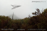 Michael O'Kane, poster for 'just playing' photo exhibition, Photospace Gallery fine art photography, toys Photoshopped into new Zealand landscapes, model trains planes aircraft cars in New Zealand landscape scenes